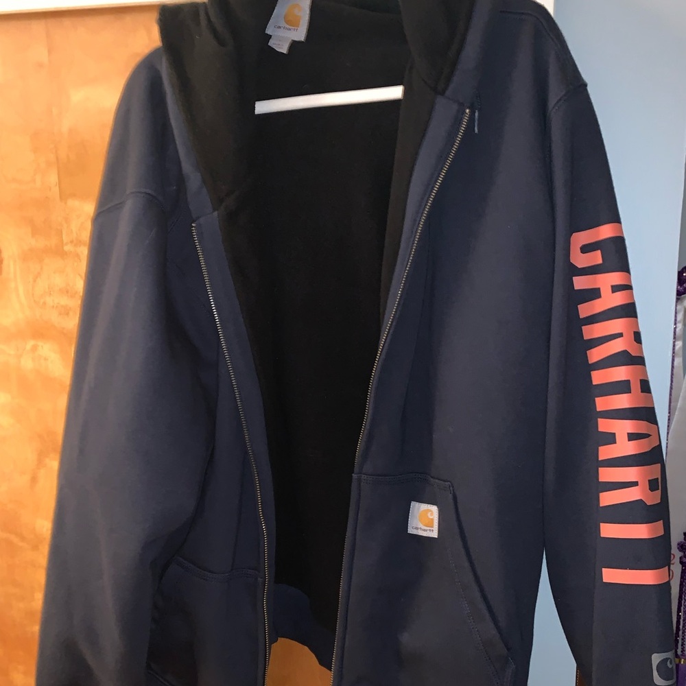Carhartt navy blue heavyweight rain defender hoodie.
